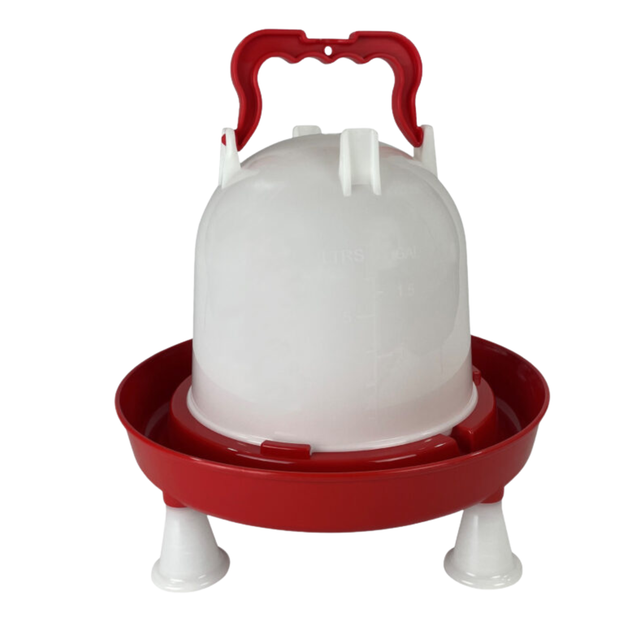Red and white plastic chicken feeder on a white background